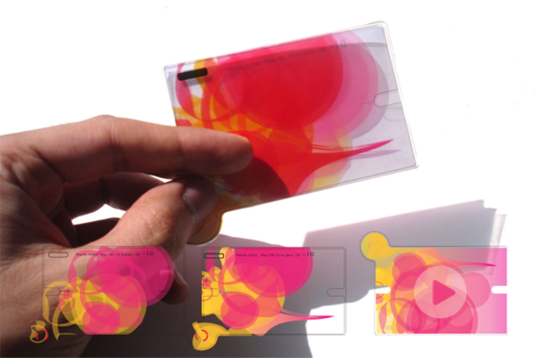 Pink and yellow generative pass designs — the visual language of Glowing Citizens