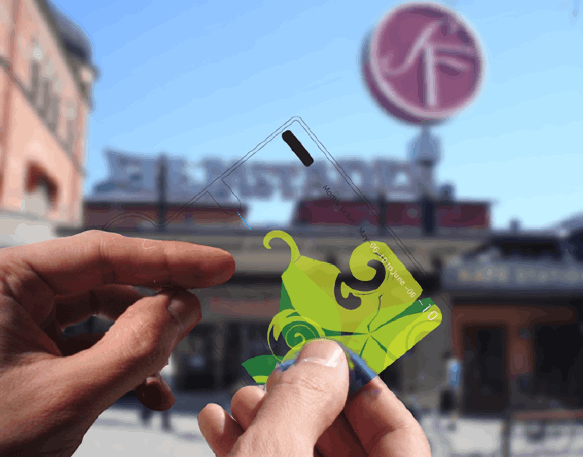 Glowing Citizens — transparent digital travel pass held up against the city