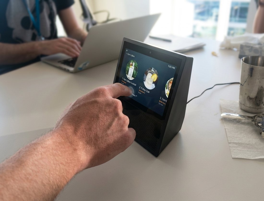 Participant touching Echo Show screen during recipe selection