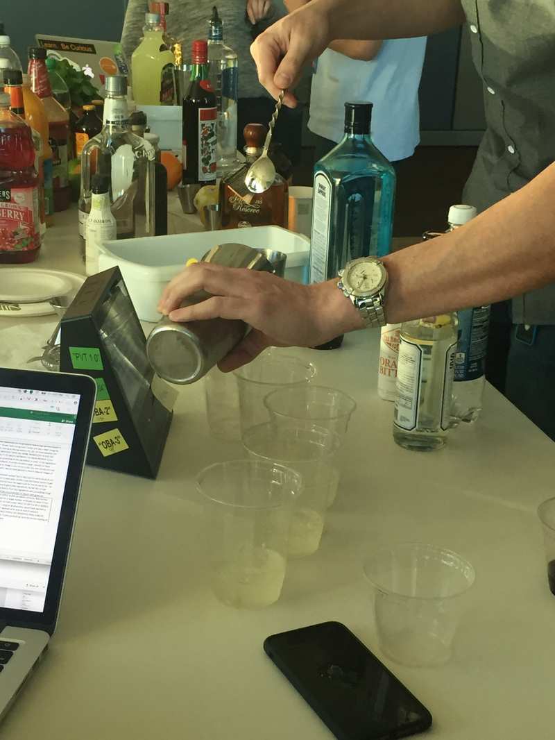 Participant making cocktail during prototype test session