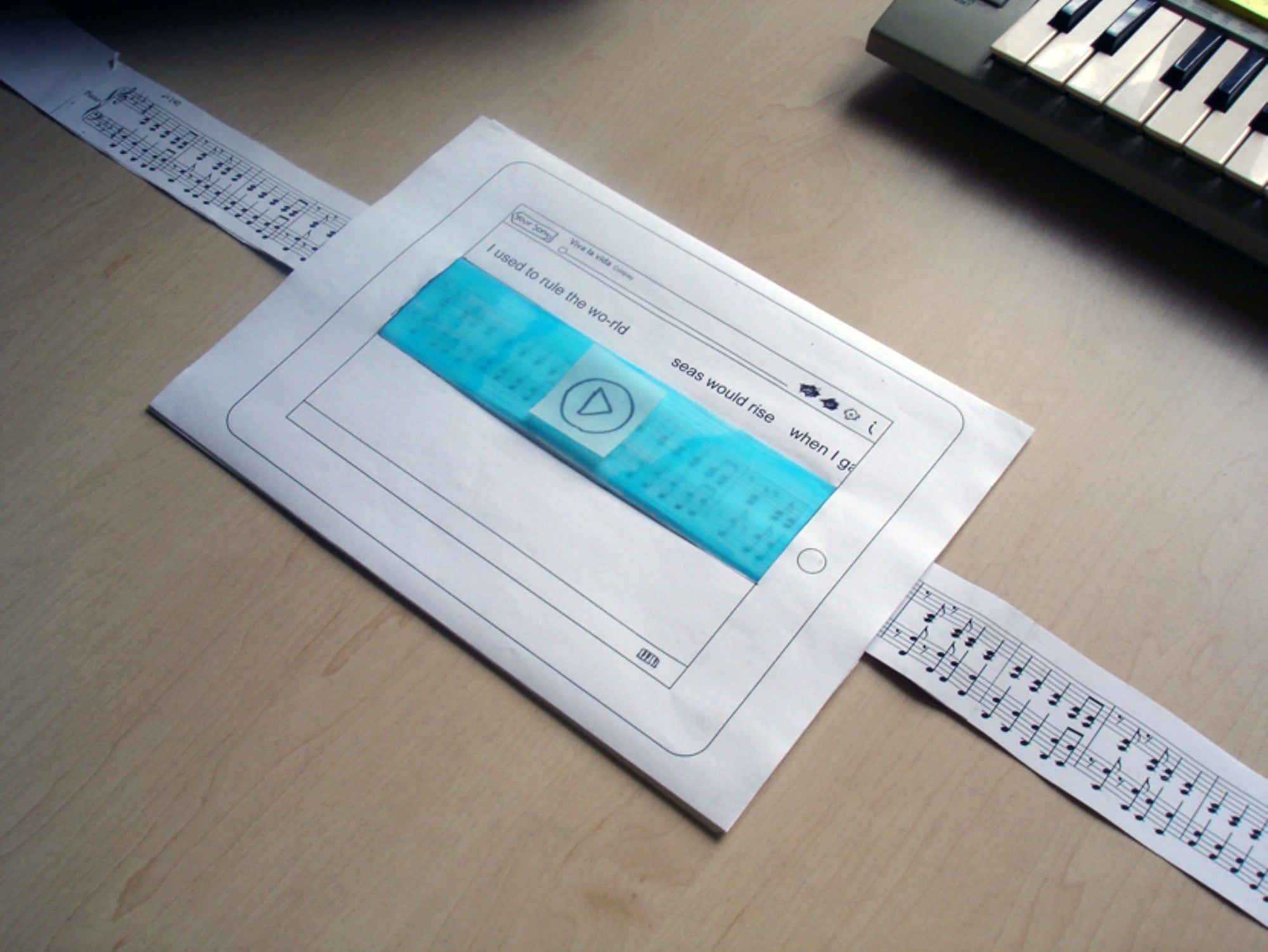 Paper scrolling prototype on tablet with sheet music strip